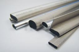 Fabric-/foil over foam gaskets